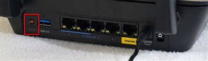 How do I reset my dslw200 modem?