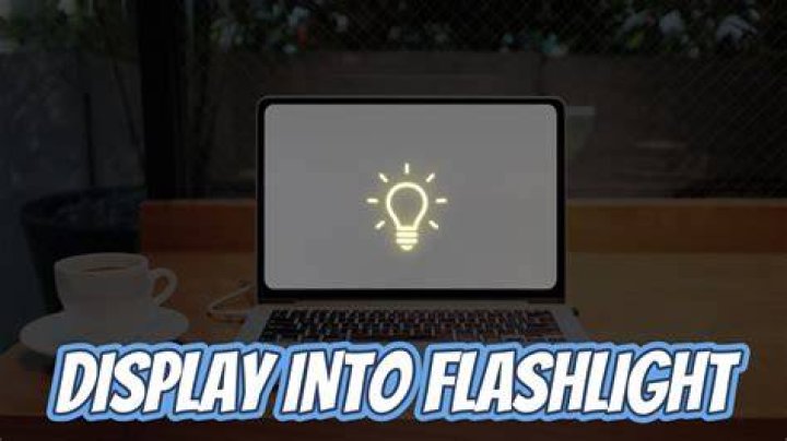 How do I turn on the flashlight on my computer?