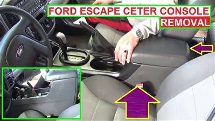 How do you remove the center console from a Ford Focus?