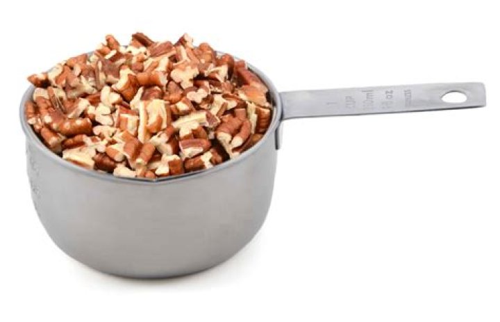 How many grams is a cup of chopped nuts?