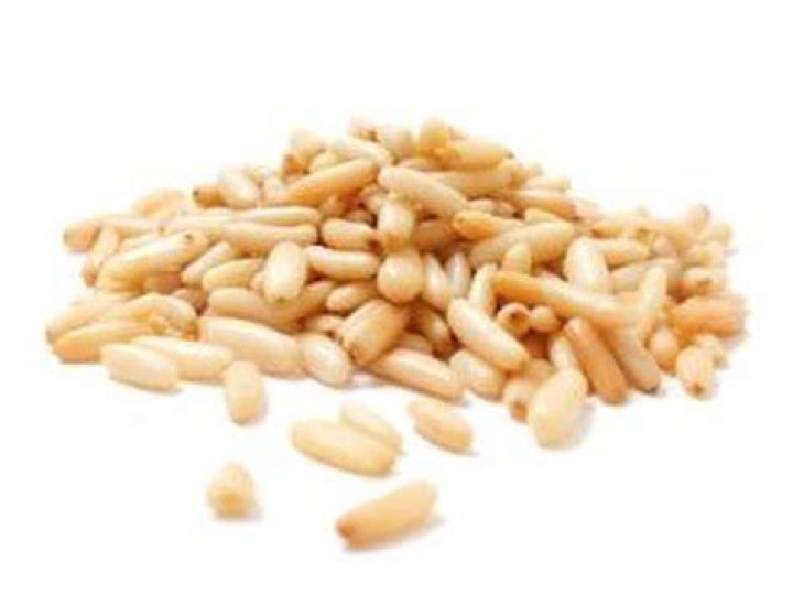 How many grams is a cup of pine nuts?