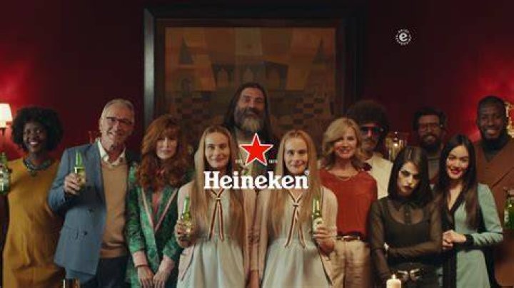 Who sings the Heineken commercial song?